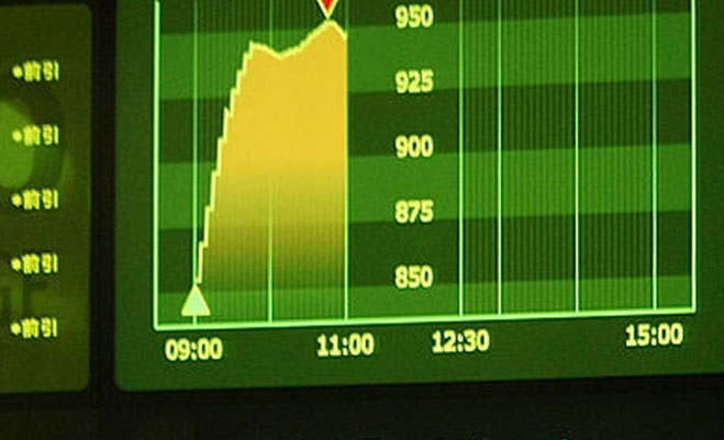 Tokyo stock market hits 21-year high