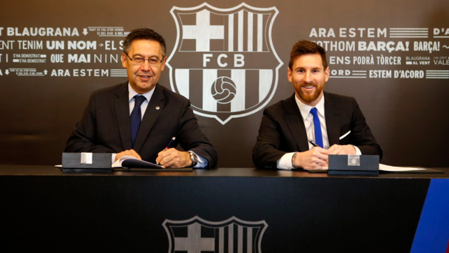 Messi signs new Barca contract until 2021