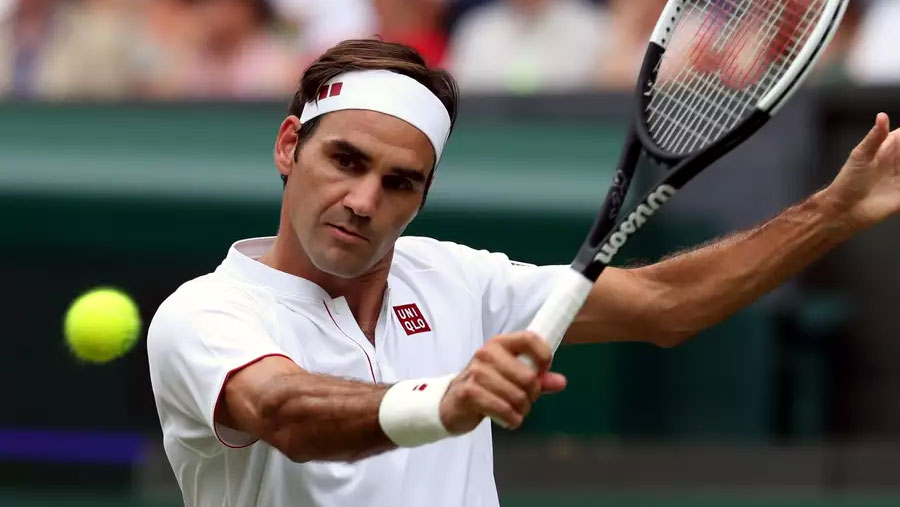 Federer continues flawless run at Wimbledon