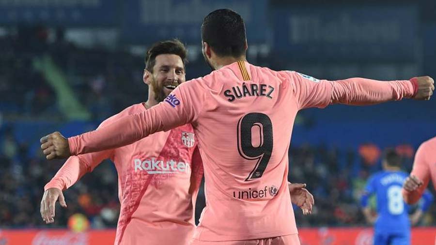 Messi and Suarez take Barca five points clear