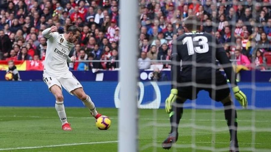 Bale scores 100th Real goal in derby win