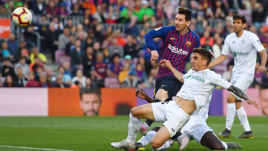 Barca damage Getafe's C' League bid with 2-0 win