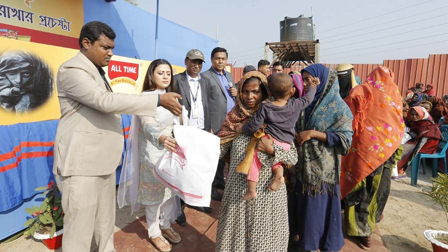 All Time distributes clothes among cold-hit people