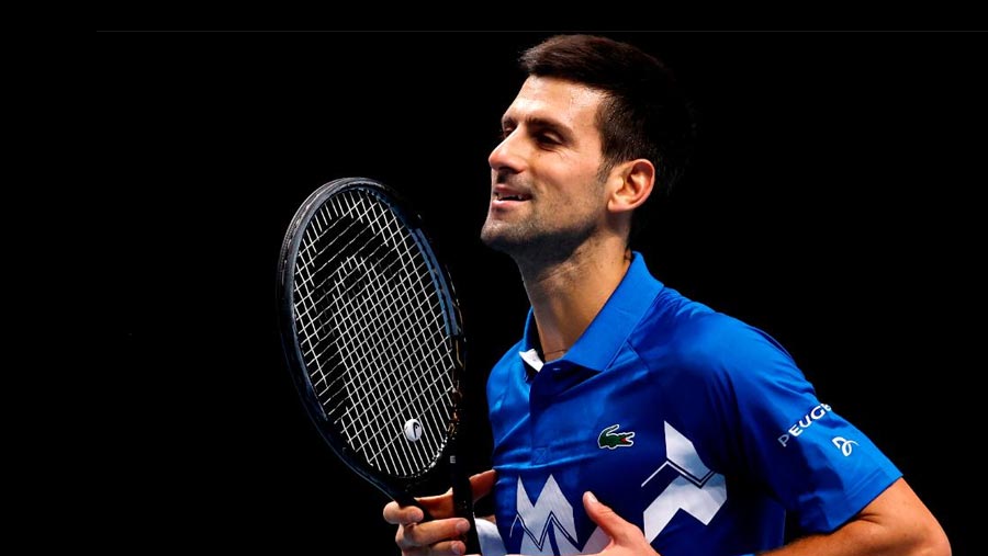 Djokovic reaches ATP Finals last four