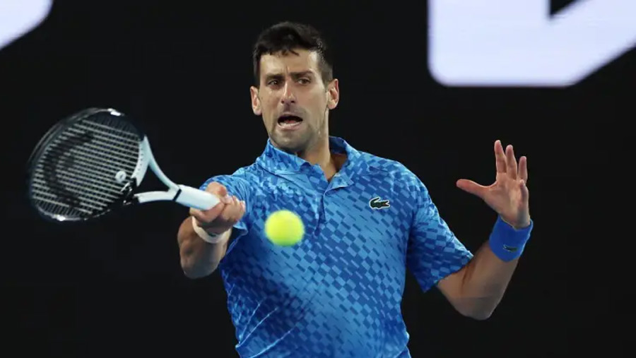 Djokovic defies injury in Australian Open win