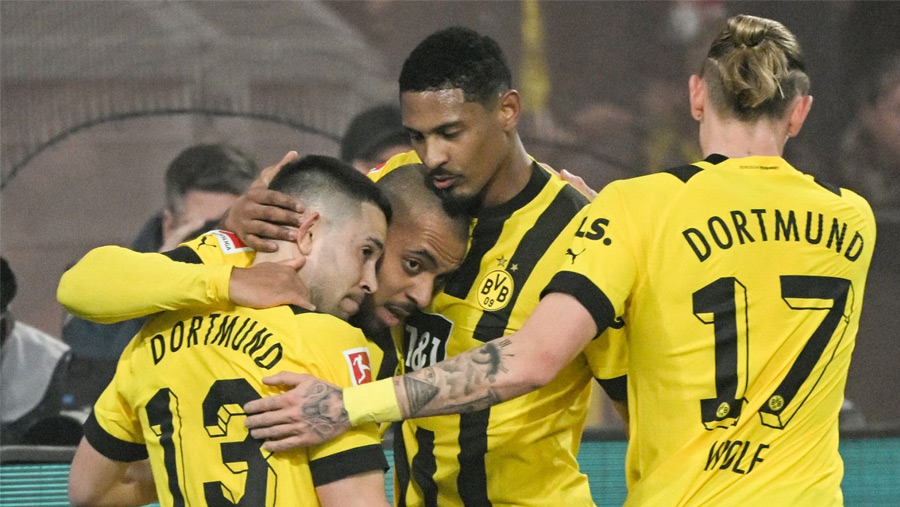 Bundesliga: Dortmund put six past Cologne to go top